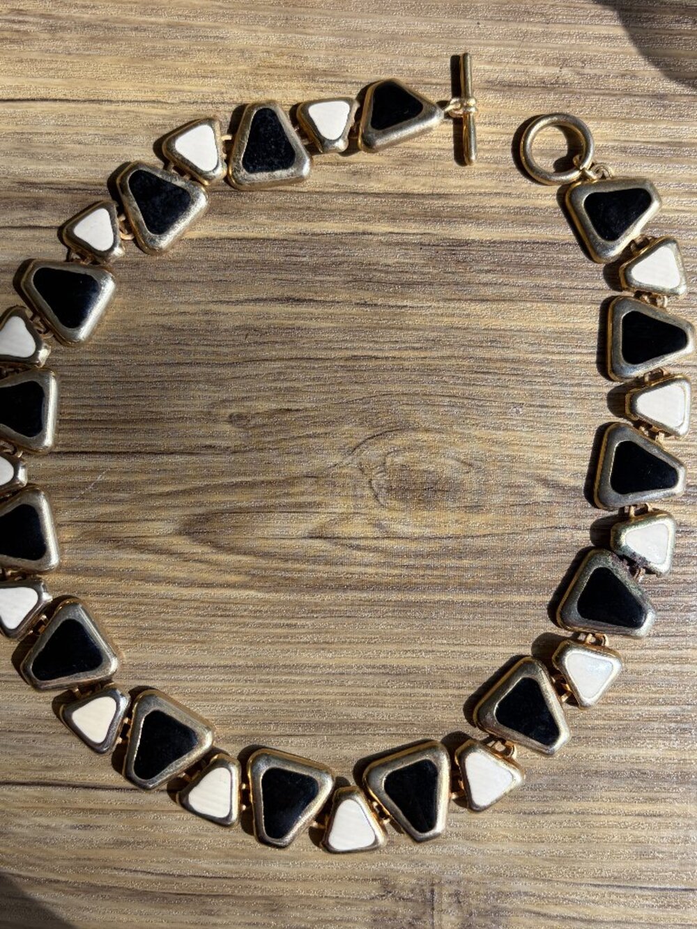 gold white and black vintage necklace i got from paris